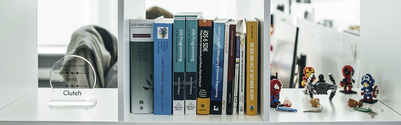 A bookshelf with books on programming