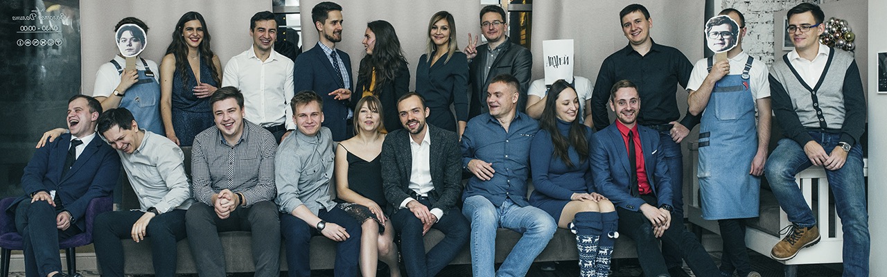 Twenty people of Exyte team smiling